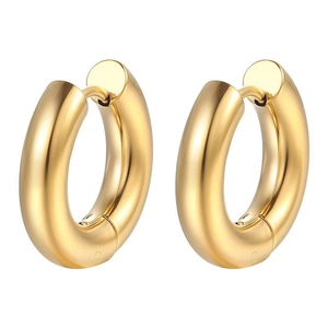 Close-up of thick 18k gold plated stainless steel hoop earrings on a white background