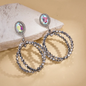 Geometric hollow oval earrings with sparkling crystal and grey faceted beads on stone