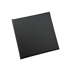 Macro shot of matte black square jewelry gift box with elegant gold foil lettering