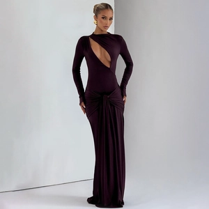 Detail of the elegant deep purple evening dress featuring hollowed chest and ruched skirt