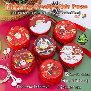 Detailed view of Christmas themed tinplate coin purses with festive cartoon patterns