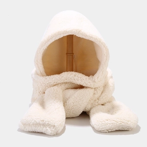 Detail of plush cream-white hooded scarf set showing thick warm faux fur texture