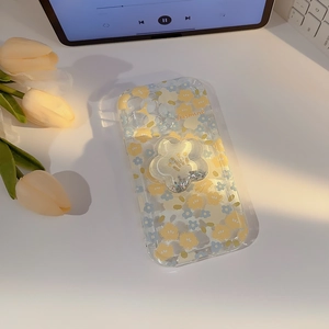 Floral iPhone case with blue and yellow patterns and matching flower phone grip detail