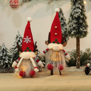 Lighted Christmas gnomes with reindeer antlers and festive hats for holiday home decor