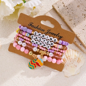 Detail of Easter beaded bracelet set with pastel beads, egg charms and letter beads
