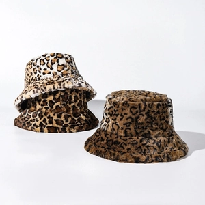 Winter faux fur leopard print bucket hat with warm gradient pattern and soft texture