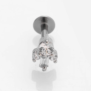 Macro detail of 316L stainless steel piercing stud with micro-set zircon crystals