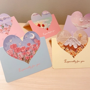 Detail of 3D oil painting greeting cards with heart cutouts and colored envelopes
