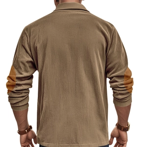 Detail of corduroy texture and contrast elbow patches on khaki long sleeve polo shirt