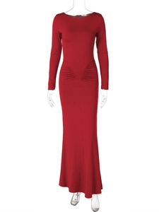 Close-up of the gathered side pleats on this slim fit dark red long sleeve maxi dress
