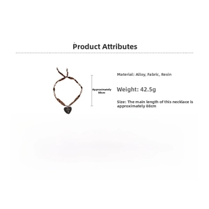Detailed view of leopard print heart cross necklace with 88cm length and alloy details