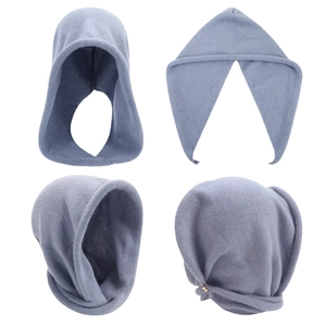 Macro detail of the light grey blue knitted fabric and texture of the balaclava scarf hat