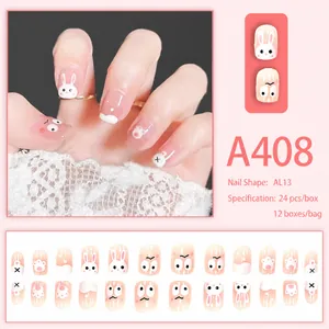 Close-up of pink press-on nails with cute cartoon bunny and cat paw patterns, style A408