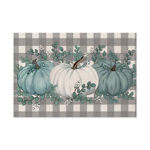 Fall Thanksgiving placemat with pumpkin print on grey and white plaid fabric texture