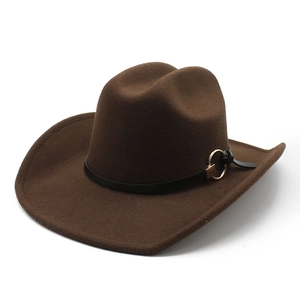 Detail of dark brown wool felt cowboy hat with black leather band and gold metal ring