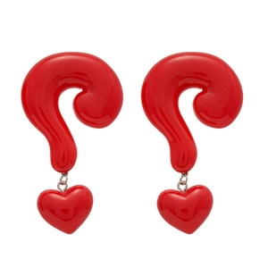 Exaggerated red heart and question mark drop earrings in polished resin finish