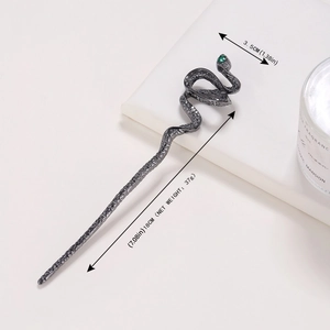 Sleek dark grey snake hair pin with green eye and scale texture for elegant updos