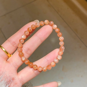 Elegant natural sunstone crystal bead bracelet with warm orange tones for women