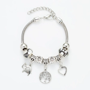 Silver tree of life charm bracelet with elephant and heart beads on a snake chain