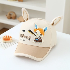 Detail of kids baseball cap featuring 3D rabbit ears and cartoon bunny patch on crown