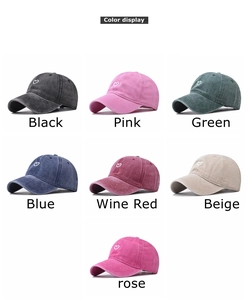 Multi-color display of washed cotton baseball caps with heart embroidery