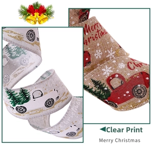Detail of Christmas ribbons with festive truck and tree patterns for gift wrapping