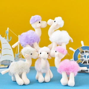 Collection of colorful plush camel pendants in vibrant purple, pink and white hues for bags