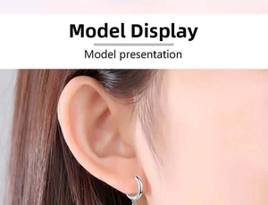 Close-up of minimalist silver green agate earrings on a model showing the S925 hallmark