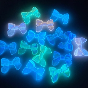 Luminous UV glowing bow-shaped beads for DIY phone charms and keychains in dark environment