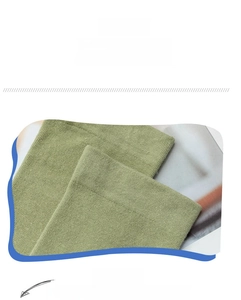 Detail of ribbed elastic cuff on green combed cotton socks for maximum comfort