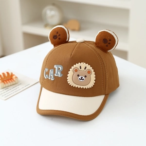 Detailed close-up of brown kids lion baseball cap with cute 3D ears and embroidery