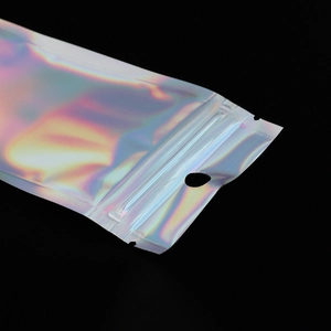 Iridescent laser PET ziplock bag for jewelry with hanging hole on black background