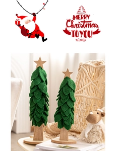 Close-up of green felt Christmas tree decorations with wooden stars and bases