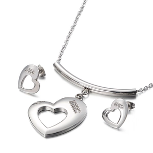Polished silver heart jewelry set with necklace and earrings featuring sparkling stones