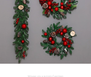 Detail of Christmas garland and wreaths with red berries, pine cones and frost finish