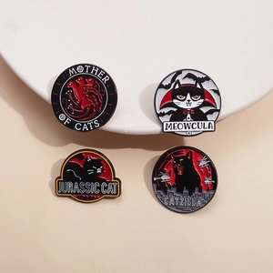Set of four cartoon cat enamel pins featuring horror and movie parody designs for bags