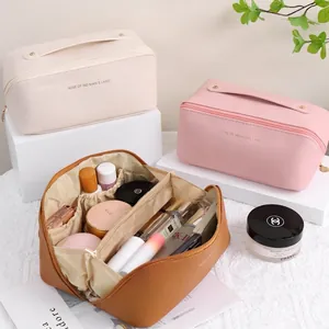 Large PU leather cosmetic travel bag with multi-compartment storage and top handle