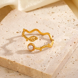 French vintage gold leaf ring with white pearl inlay and organic wave design