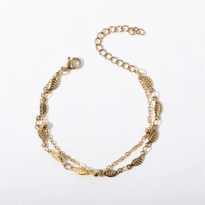 Double-layer gold stainless steel bracelet with leaf pendants and bead chain details