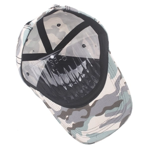 Detail of camouflage cotton baseball cap interior with metal buckle and sweatband