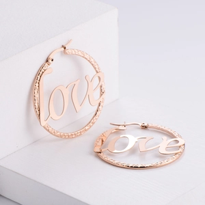 Titanium steel rose gold hoop earrings featuring cursive love letters in a minimalist style