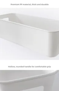 Close-up of white plastic storage box made of thick PP material with ergonomic handles