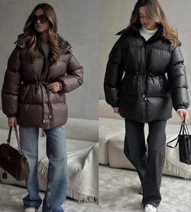 Detail of drawstring waist and hooded design on casual mid-length winter coats