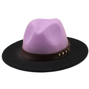 Close-up of wool felt jazz hat showing lavender crown and black wide brim with leather band