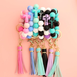 Silicone bead wristlet keychains with Jesus cross charm and faux leather tassels