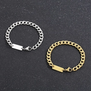 Matching silver and gold Cuban chain bracelets with engravable blank ID plates