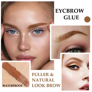 Macro detail of waterproof brown eyebrow glue showing brush texture and natural look