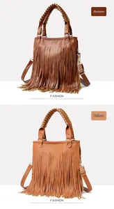 Close-up of bohemian tassel handbags in brown and yellow with metal stud details