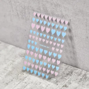 Detail of ultra-thin nail art stickers featuring pink and blue heart patterns to 2495