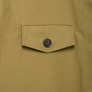 Khaki utilitarian set featuring short sleeve shirt with buttoned flap pocket detail